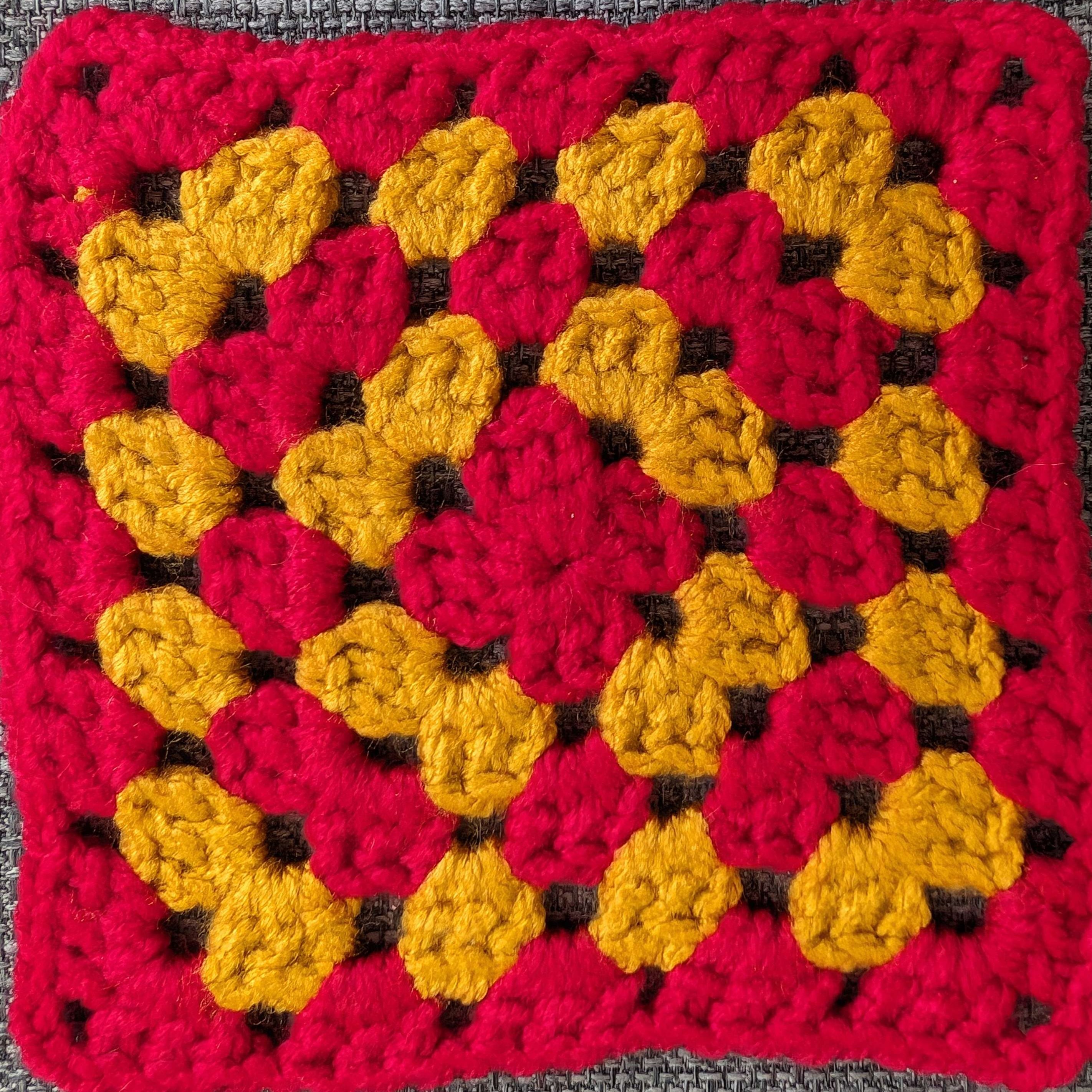 A closely cropped image of a crochet square